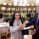 Amy Brittain-Cartlidge  receives her award from Buxton & Leek College Principal Len Tildsley