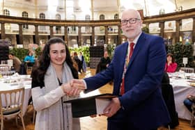 Amy Brittain-Cartlidge  receives her award from Buxton & Leek College Principal Len Tildsley