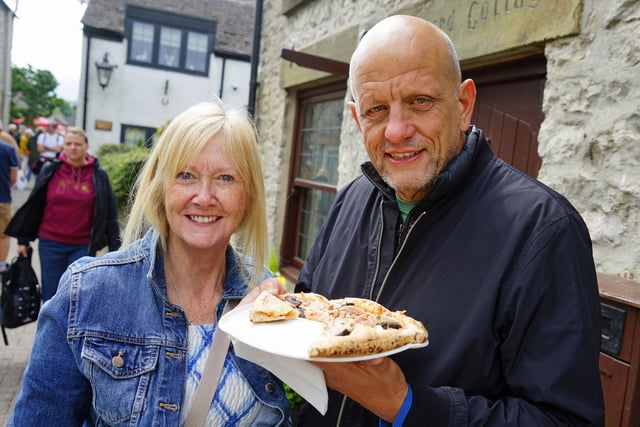 Tideswell food festival. Jane and David Calladine enjoy a pizza.