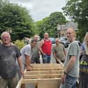 The Lifters and Shifters hard at work. Photo Michael Hilton