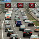 Motorists drive on the hard shoulder of one of the busiest stretches of motorway in Britain between junctions 3 and 7 of the M42