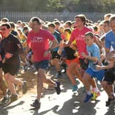 Olympic legend Seb Coe and his son Harry Coe join hundreds of runners at a parkrun. (Photo by Ian Gavan/Getty Images for Vitality)