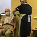 Mr Robert Stopford-Taylor, the first patient to be vaccinated at a primary care site in Derbyshire
