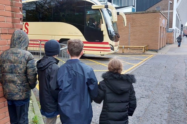 Youngsters watch the team bus arrive. Picture submitted