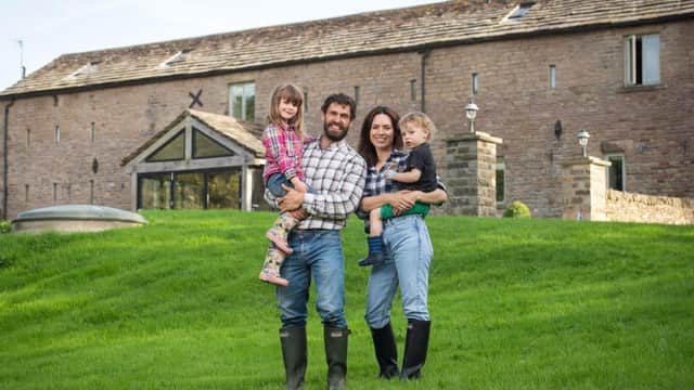 Kelvin Fletcher with his wife Liz and two of their four children, Marnie and Milo.