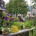 Visitors enjoy Smithy garden in Buxton last year.