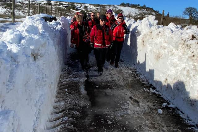 Buxton Mountain rescue team walking through the cleared snow drift. Pic submitted