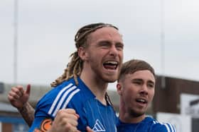 Kieran Burton and Johnny Johnston celebrate the win.