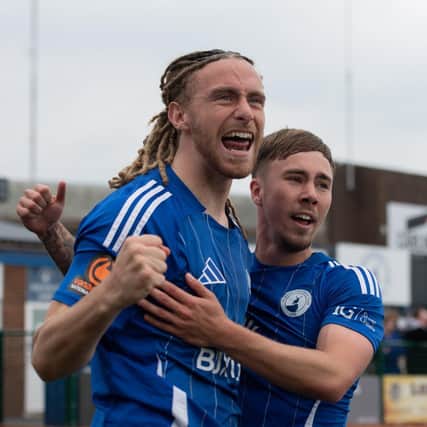 Kieran Burton and Johnny Johnston celebrate the win.