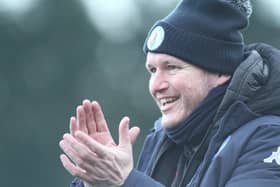 Buxton FC manager Steve Cunningham says the effort of the fans was unbelievable after spending five hours clearing snow from the pitch.