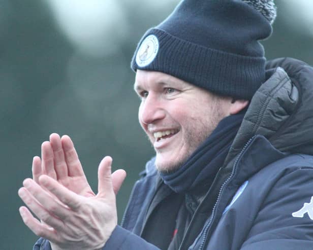 Buxton FC manager Steve Cunningham says the effort of the fans was unbelievable after spending five hours clearing snow from the pitch.