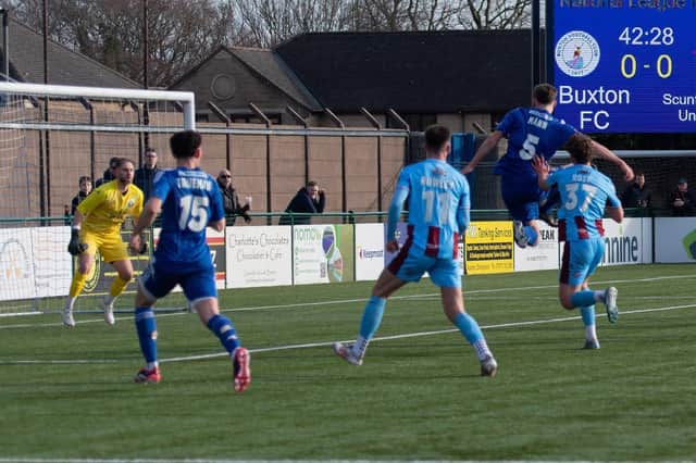Ethan Mann volleys home Buxton's goal. Photo: Phil Peat.