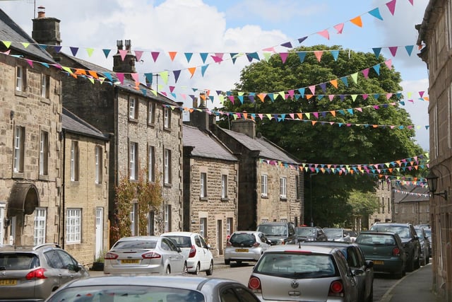 The first-time visitor is invariably surprised by Winster's grand Main Street.
