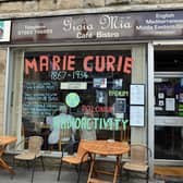 New Mills shops and buisnesses have still got into the carnival feel despite the parade being cancelled by decorating their windows