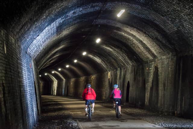 Chee Tor Tunnel, one of four tunnels which visitors pass through on the Monsal Trail. Photo: Peak District National Park Authority/Alex Hyde