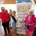 Hayfield Wells Dressing Queen and Sue Barber at a recent Hayfield event with a representative from Cardiac Risk in the Young. Pic submitted