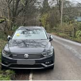 The driver has received a fine after he chose a parking spot on the bend of the road, causing danger to other cars and ruining grass.