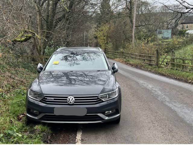 The driver has received a fine after he chose a parking spot on the bend of the road, causing danger to other cars and ruining grass.