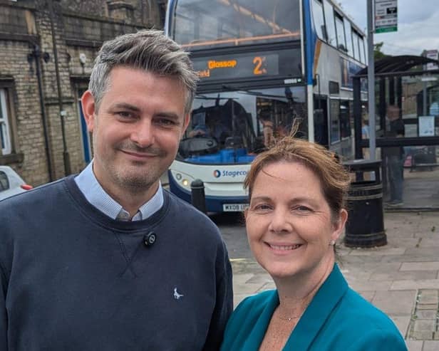 Jon Pearce MP and Mayor Claire Ward pleased to be delivering on their free travel promise.