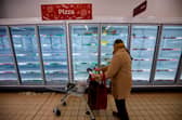Some shoppers have been panic buying again in the build up to lockdown. Picture: Getty. (Photo by TOLGA AKMEN/AFP via Getty Images)
