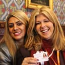 Raj Johal, executive director of Derby carers organisation Blue Sky Brokers with carers champion Kate Garraway, is urging people to check up on people who are carers at Christmas