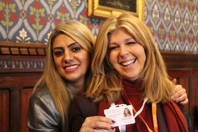 Raj Johal, executive director of Derby carers organisation Blue Sky Brokers with carers champion Kate Garraway, is urging people to check up on people who are carers at Christmas