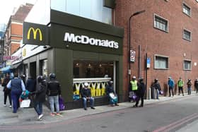 Delivery drivers line up outside the reopened McDonalds in Dalston today. Picture by Julian Finney/Getty Images.