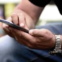 A man who twice failed to provide a PIN code for his mobile phone after being stopped at Belfast International Airport has been given a suspended prison term. Picture: pixabay (generic image).