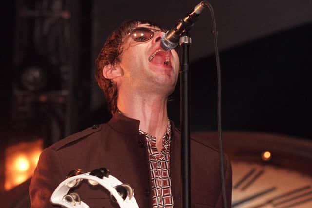 Liam Gallagher on stage at Sheffield Arena in 1997. Picture: Dean Atkins.