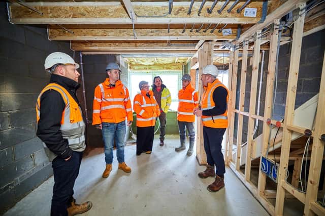 The visitors to Midshires Meadow were given a tour of a property under construction in Whaley Bridge