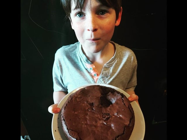 Kylie Valentine's son was left looking pretty pleased with his first brownies. This is before they were cut.