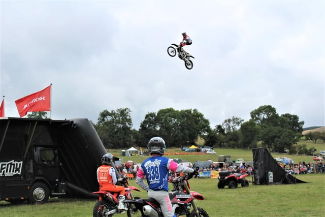 Jamie Squibb motorcycle team perform their stunts.