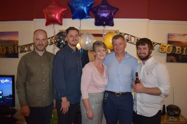 Christopher, left during his parents' birthday in September - with brothers Michael and Andrew and mum and dad Tracey and Paul