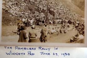 Archive photo of a Ramblers rally with members lining the slopes of Winnats Pass in 1930.