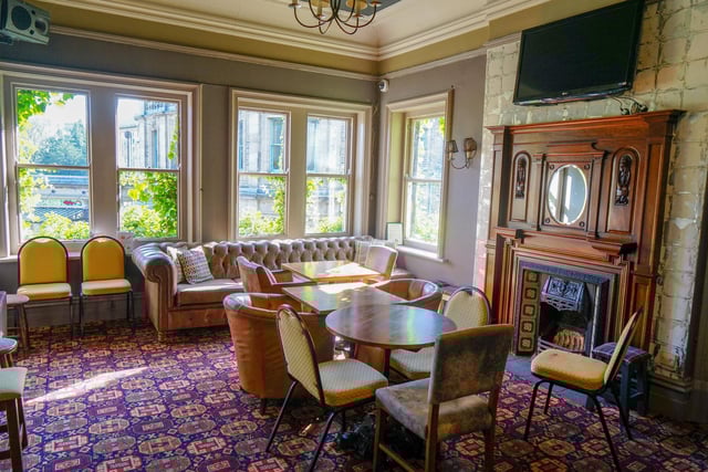 A real fireplace ready to welcome people for a cosy drink. Photo Brian Eyre