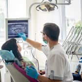 Derbyshire needs more dentists and other dental professionals to plug NHS service gaps and patients with good hygiene will be advised to visit less regularly, a meeting has heard.