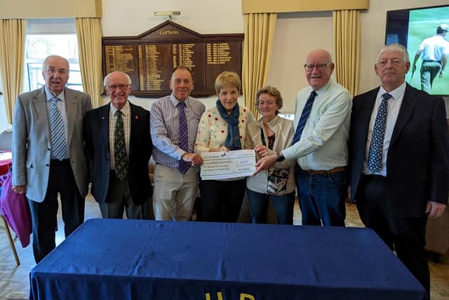 At the Derek Horsey Memorial cheque presentation were Ken Gibson, Bill Wheeler organiser of the Derek Horsey charity, along with Jill Pearson, director of the Buxton Samaritans along with golfers who competed in the event and other charity representatives.