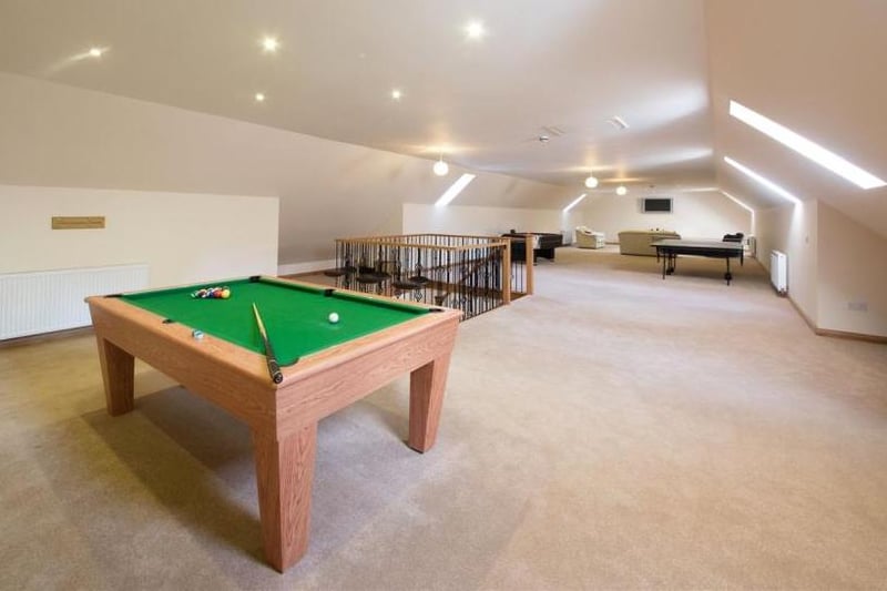 There's no shortage of areas to entertain or keep the kids amused, as this fabulous games room ably proves.