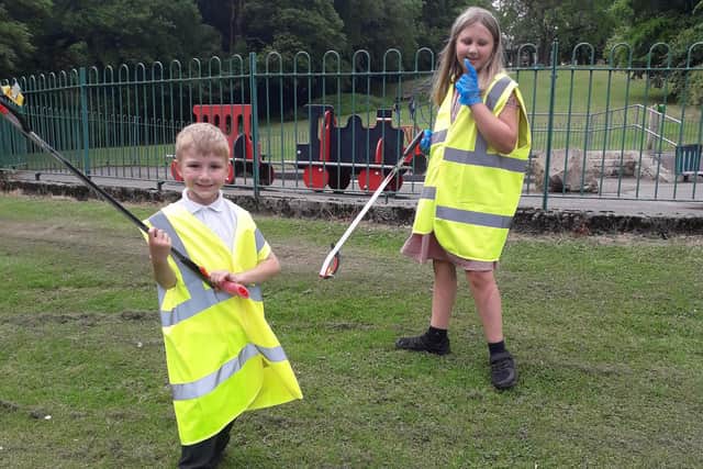 George and Eva Harwood cleaning up their local park last week.