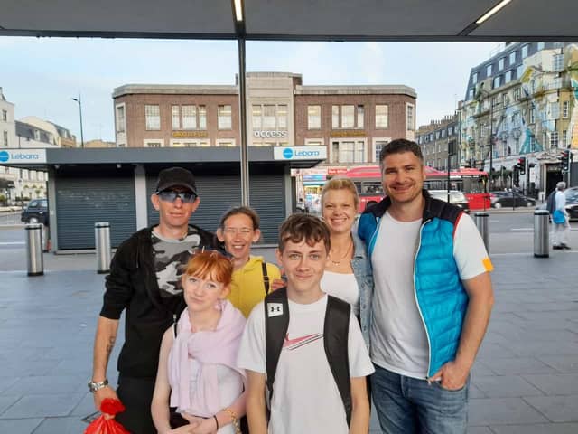 Jim Wood, centre, with sister Lily-May-, dad Anthony, mum Joanne and Stefan Koppold and his wife Melanie, right.