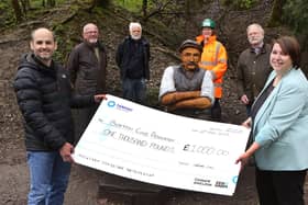 Alex Soria, Tarmac Tunstead Cement Plant manager hands over a cheque for £1,000 to Buxton Advertiser Editor Louise Cooper, watched by Buxton Civic Association representatives John White, John Phillips and Brian Shawcross, as well as Josie Shereston from Tarmac.
