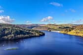An aerial view of Ladybower Reservoir and the the A57 Snake Pass making its way through the Peak District and over the Pennines. It is an area that afford unrivalled views of the Peak District.