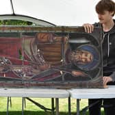 One of the missing 13 stained glass panels from St Mary's Church bought by Colin Mantripp at auction in Buckinghamshire