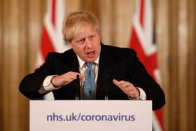 British Prime Minister Boris Johnson gives a press conference (Photo by Matt Dunham - WPA Pool/Getty Images)