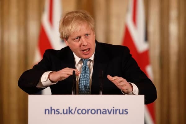 British Prime Minister Boris Johnson gives a press conference (Photo by Matt Dunham - WPA Pool/Getty Images)