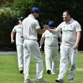 James Lister is all smiles after taking the wicket of Jack Guyte in the Chapel v Buxworth game. Photo by John Fryer.
