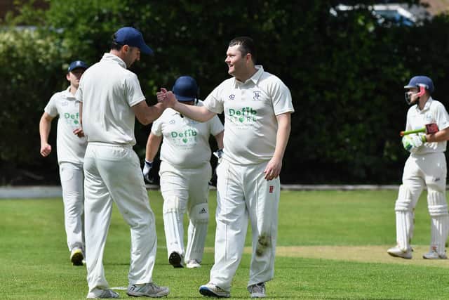 James Lister is all smiles after taking the wicket of Jack Guyte in the Chapel v Buxworth game. Photo by John Fryer.