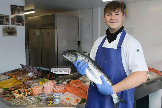 The new fish counter at RGM Seafood, Will Morris who is now working at the 100 year old firm. Pic Jason Chadwick
