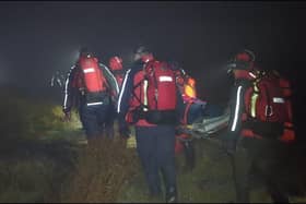 The walker was eventually brought to safety - and was taken to hospital.  Credit: Kinder MRT