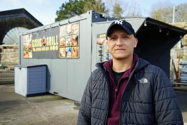 Essie Grill owner Ismail Rammo in front of his grill shack outside Buxton train station which must be removed after retrospective planning permission was not granted. Photo Brian Eyre